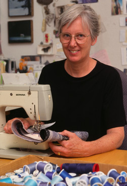 Carol at her sewing machine